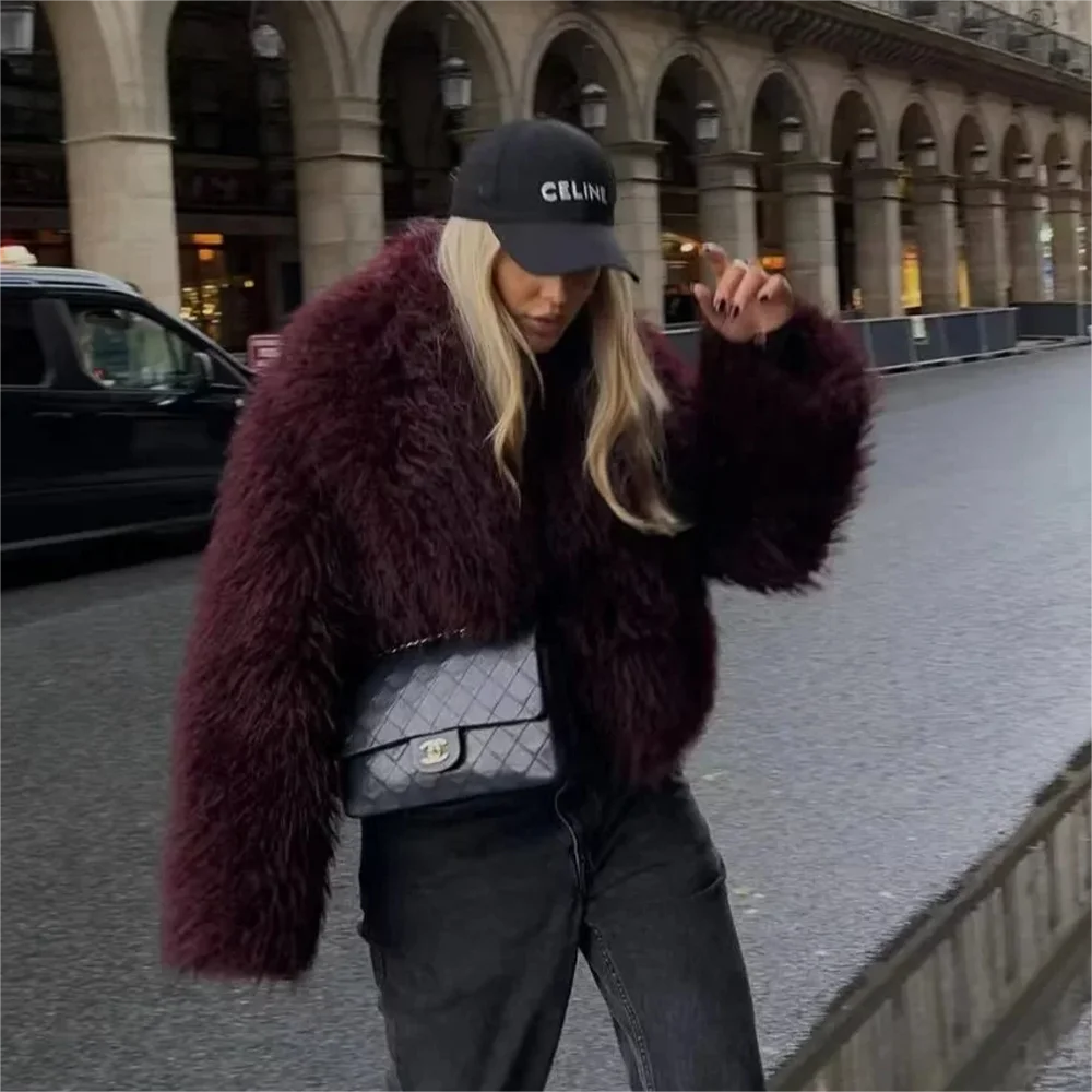 lifestyle view of oversized burgundy plush faux coat