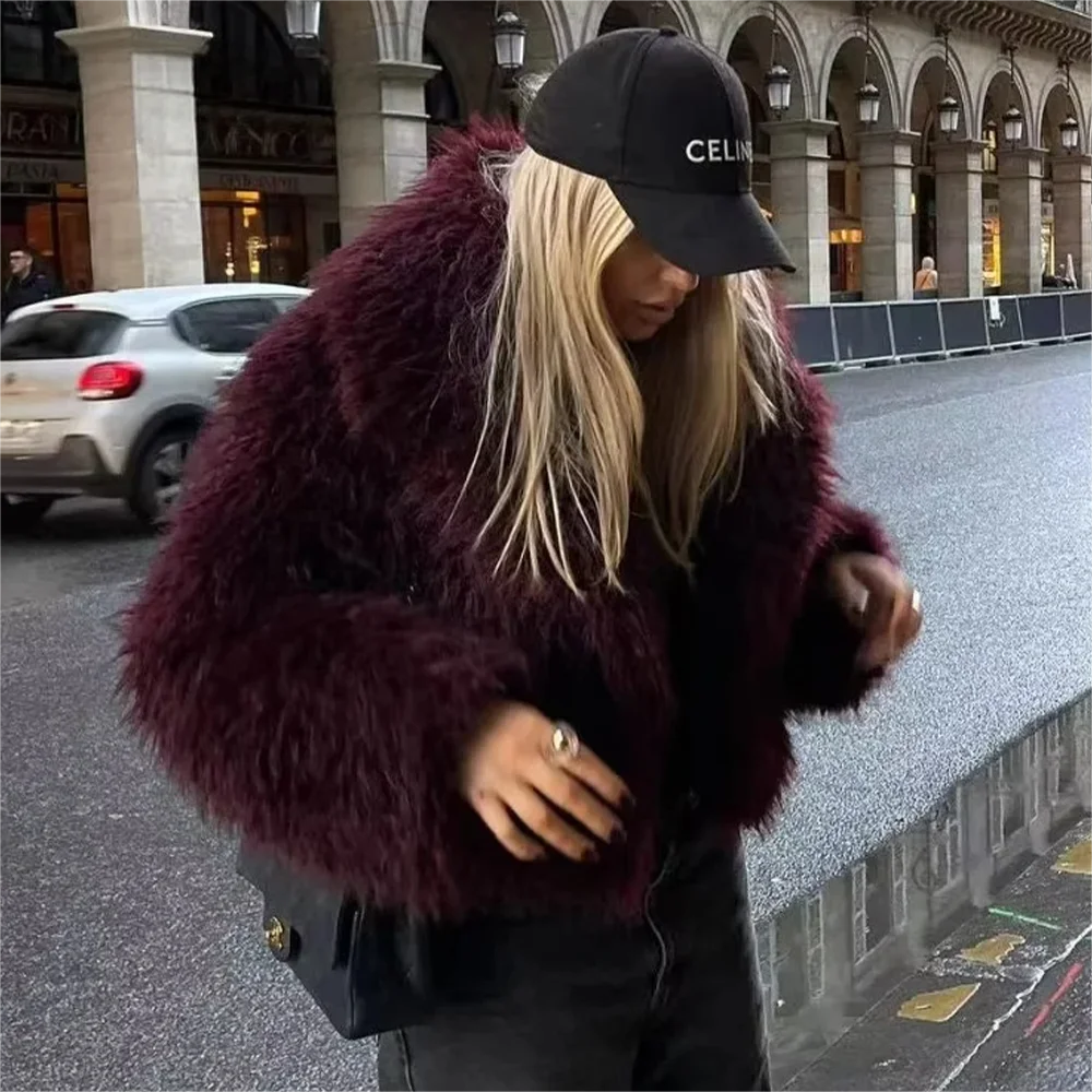 Oversized burgundy plush jacket with layered outfit