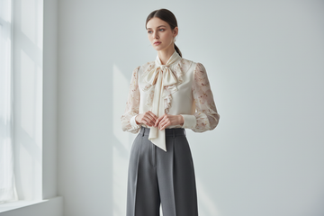 Elegant women's blouse with feminine details - luxury fashion top with refined styling and sophisticated design