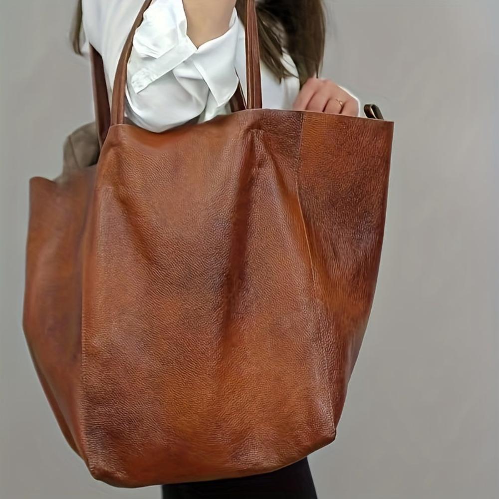Heather tote bag interior organization and spacious compartments for daily essentials