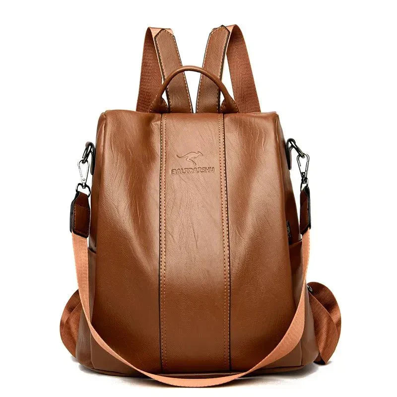 Brown convertible handbag backpack - detail of premium vegan leather and hardware