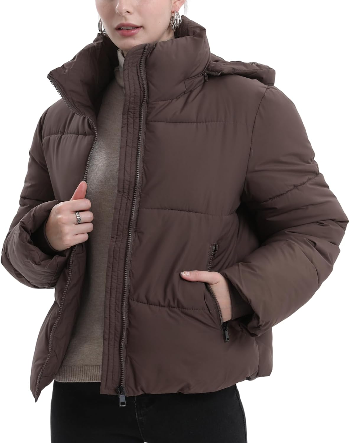 Back view of women's quilted puffer jacket showing hood and water-repellent material