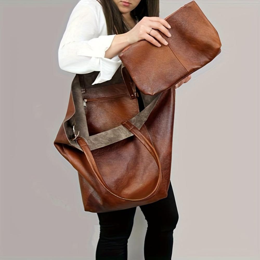 Side view of Heather vegan leather shoulder handbag displaying structured silhouette