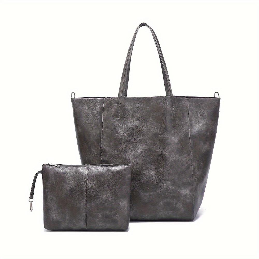 Heather vegan leather shoulder bag showing spacious interior and versatile design