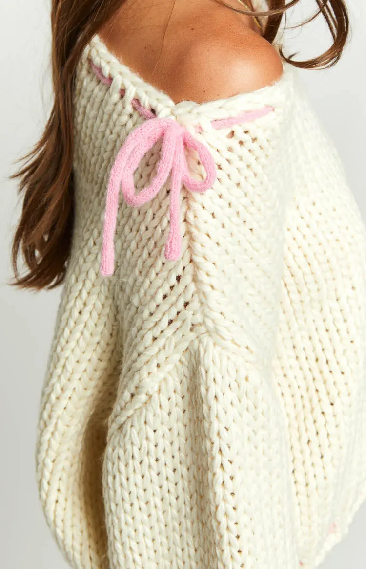 One Shoulder Chunky Knit Pullover with Pink Bow Accents