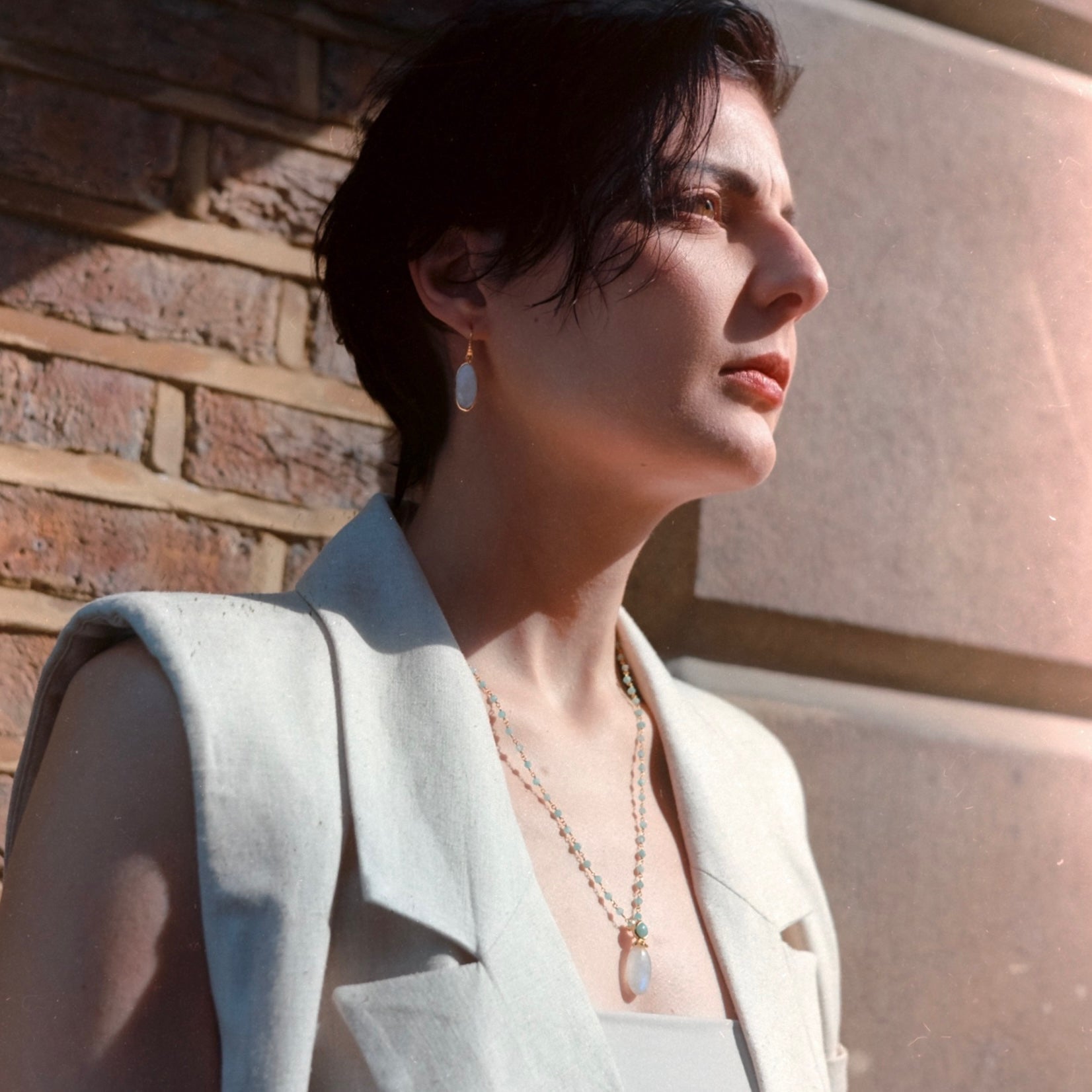 Persephone gemstone necklace detail showing moonstone and amazonite beaded chain design