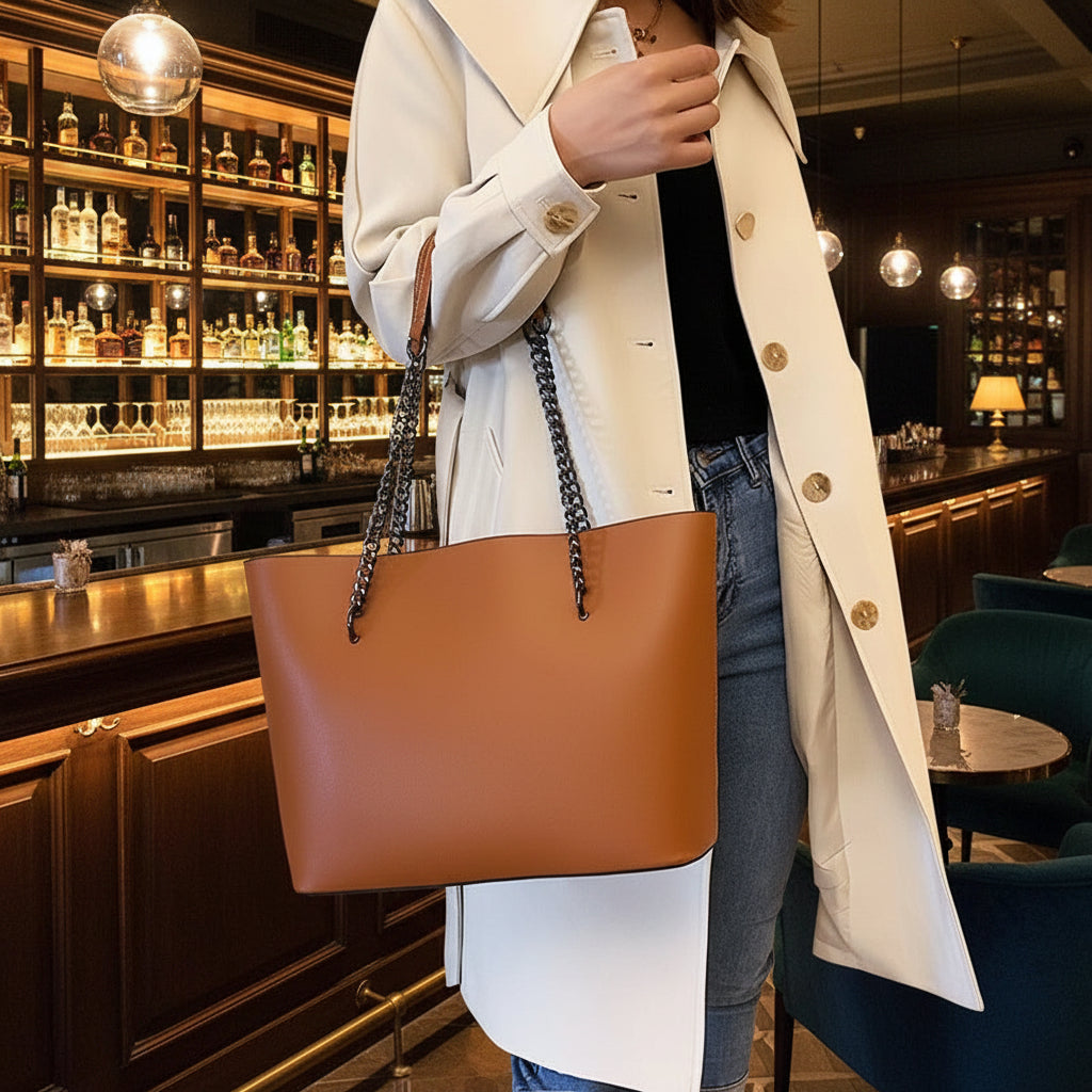 Woman carrying Sophia vegan leather chain tote bag - perfect for work and everyday use
