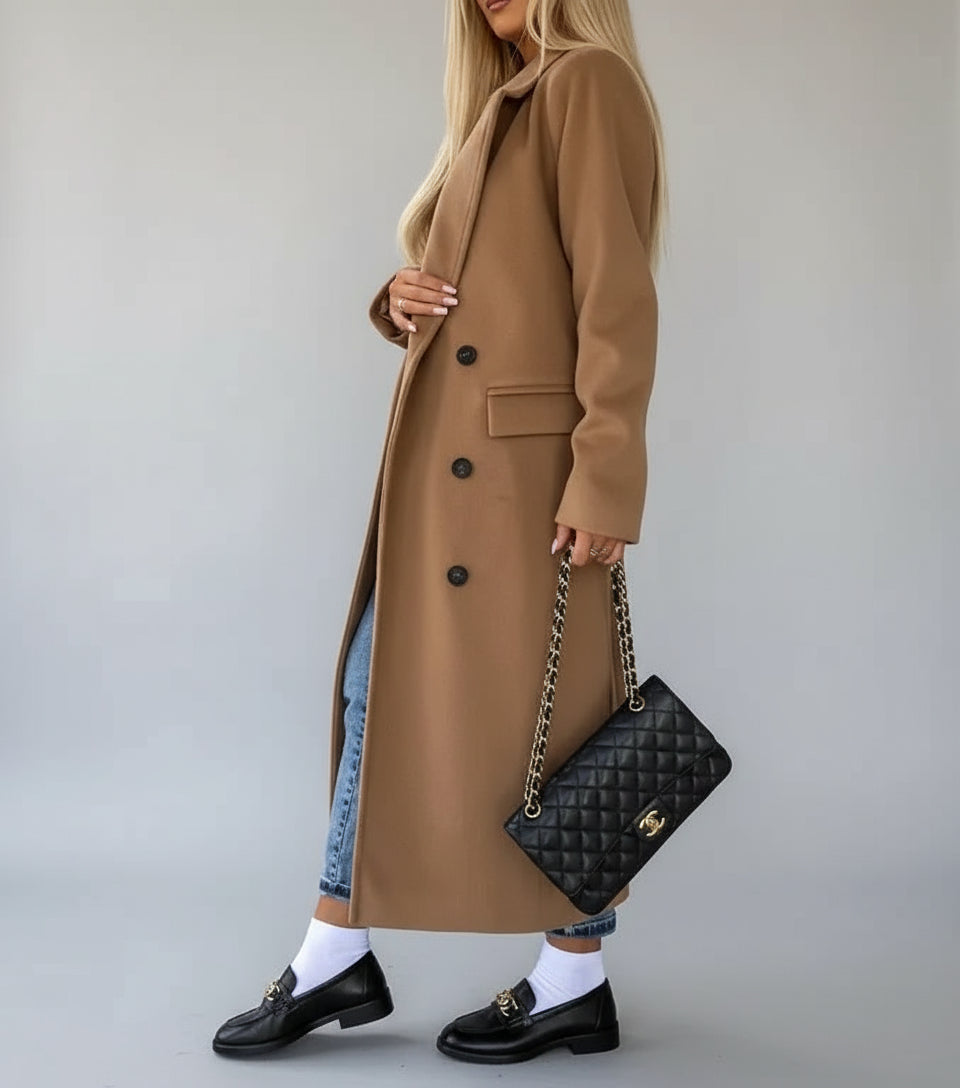 Texture and stitching detail of Aveline coat