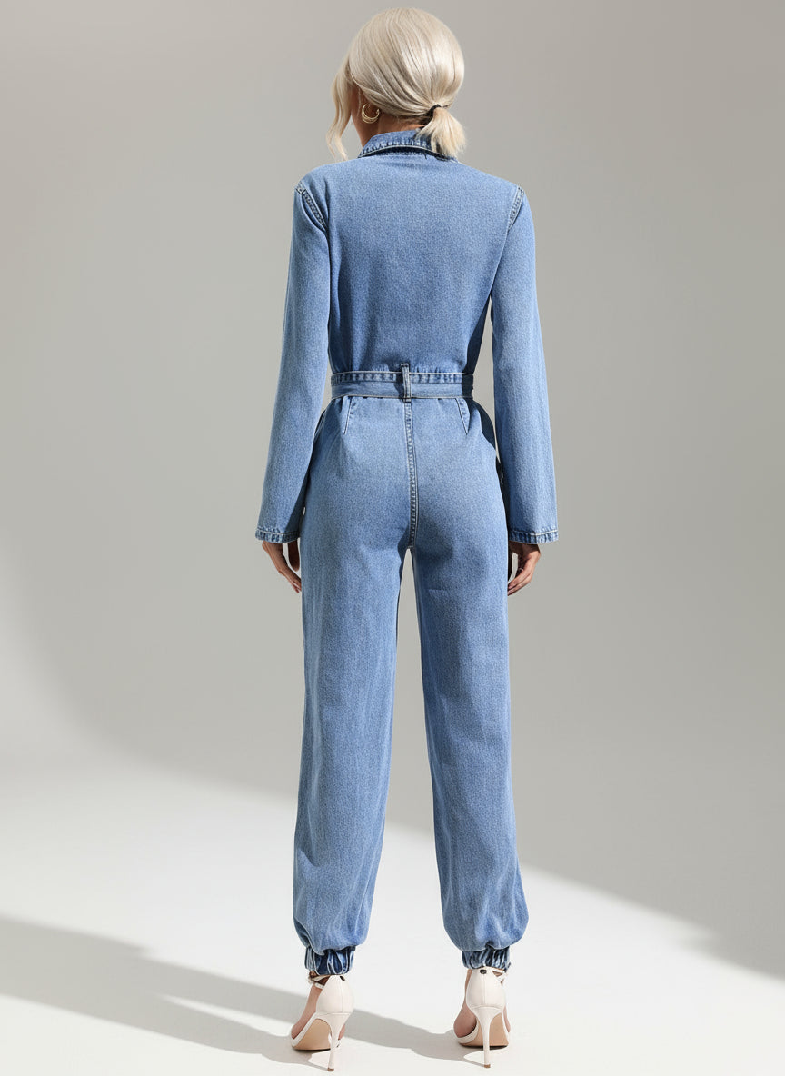 Close-up of belt and fabric detail on denim jumpsuit