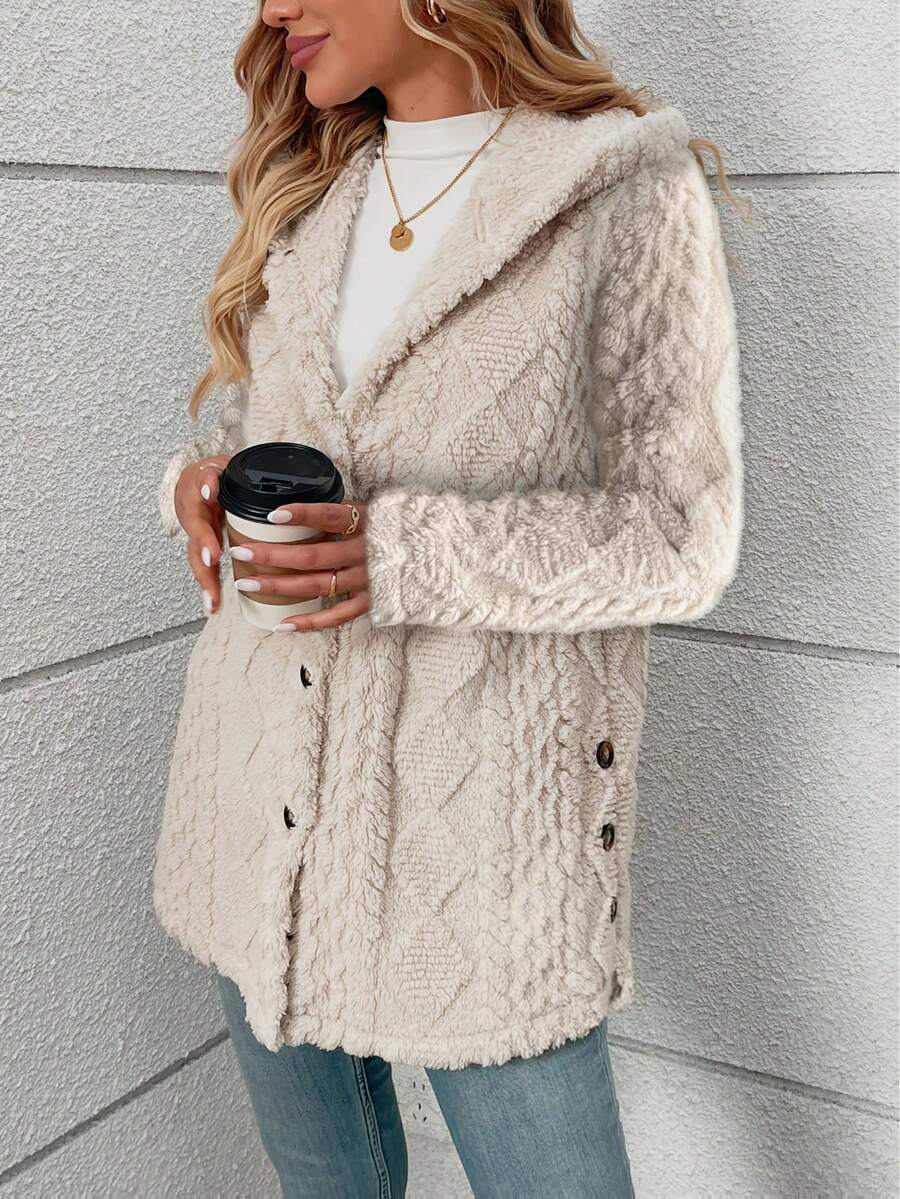 Model wearing hooded plush cardigan for casual chic style