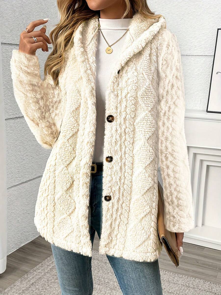 Styled outfit featuring cream plush cardigan and denim jeans