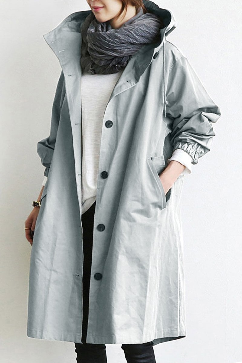 Gray women’s waterproof trench coat with hood front view