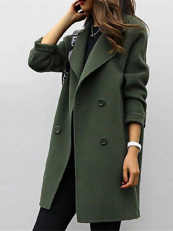 Side profile of women’s double-breasted trench coat