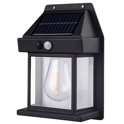 Solar powered wall light with motion sensor installed on garden wall

