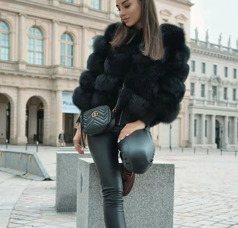 Model wearing faux fur coat black