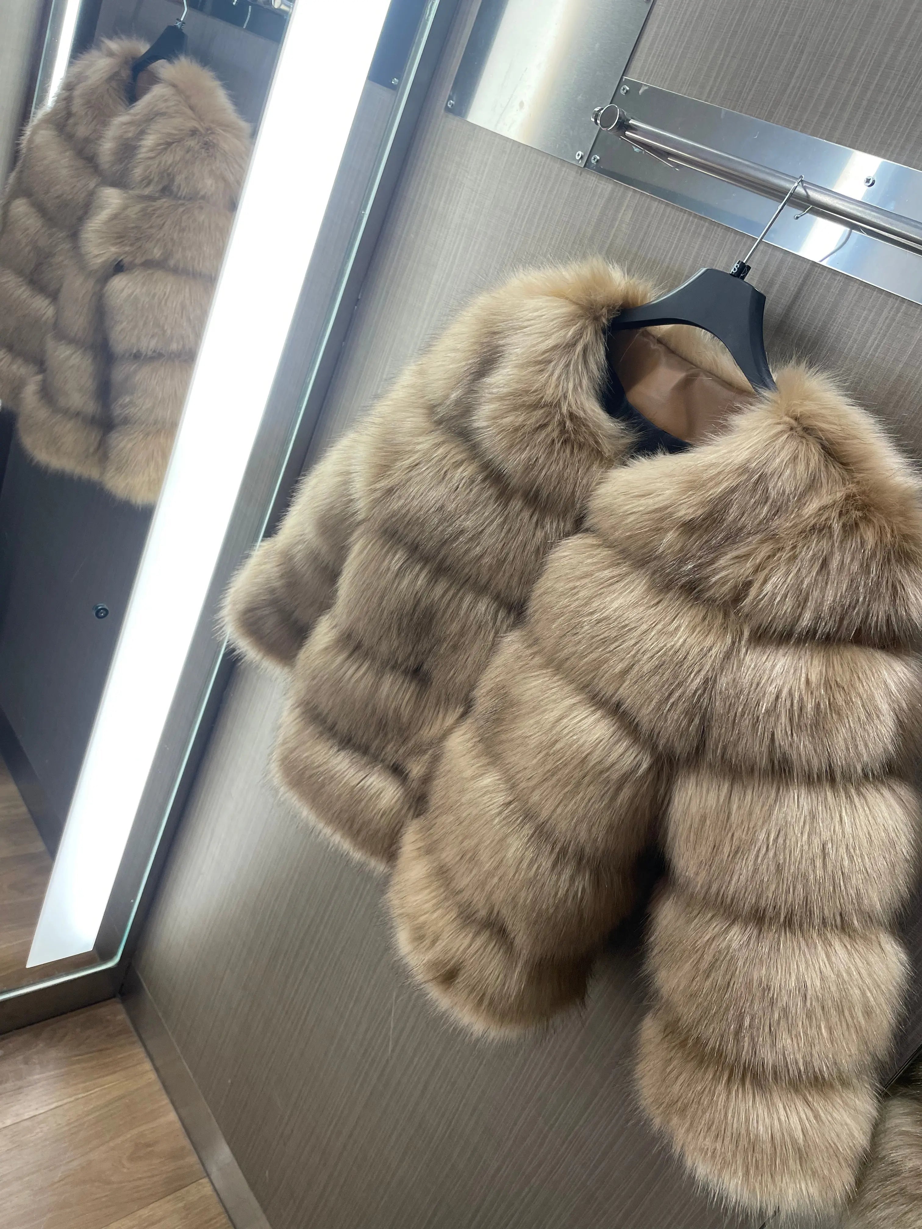Faux fur coat styled for party wear