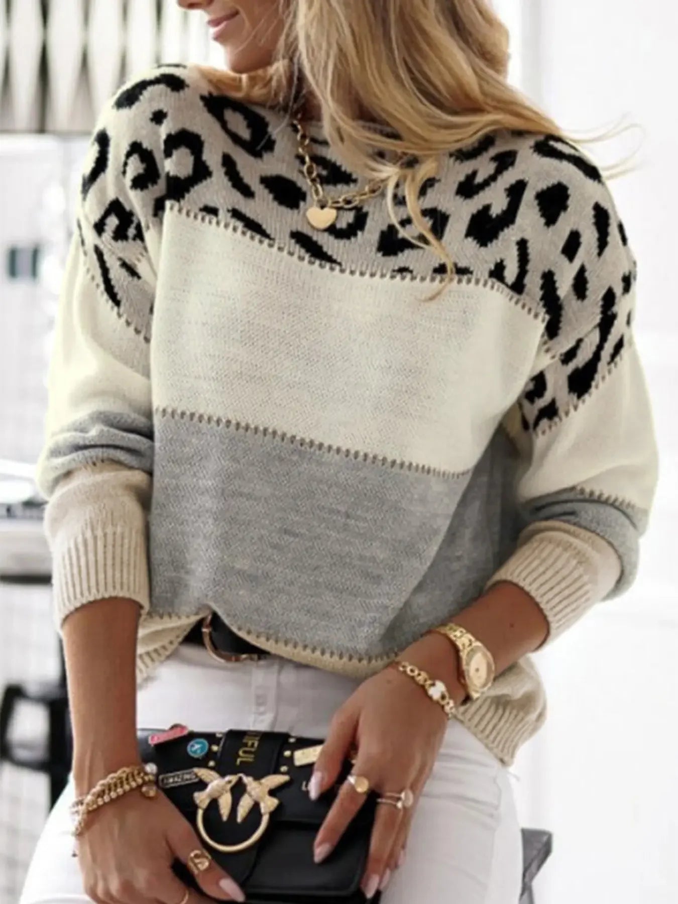 Fashion shot of women’s leopard print contrast sweater