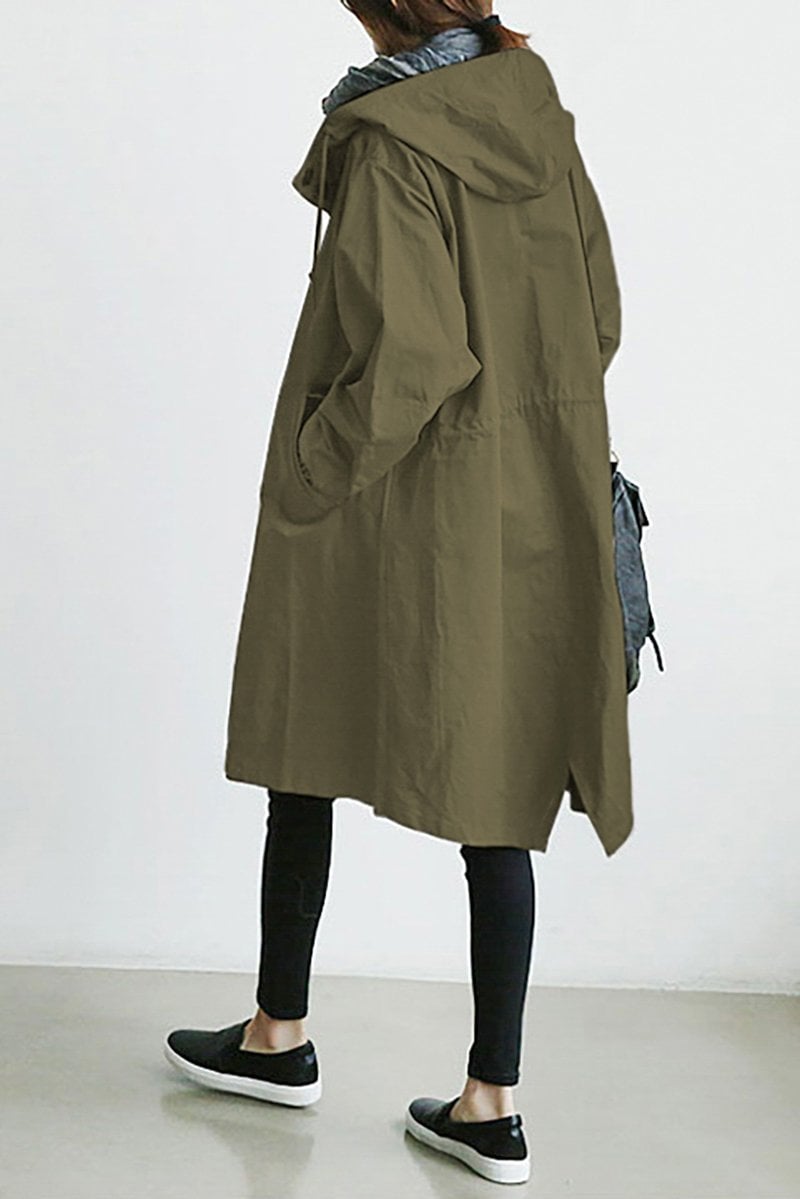 Army green waterproof trench coat styled for streetwear